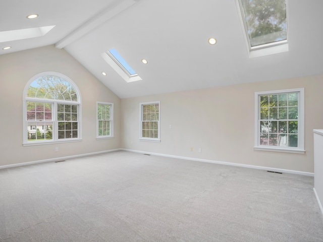 8 Argentine Way, Norwalk, CT 06850 - spare room featuring a skylight, healthy amount of natural light, baseboards, carpet, and beam ceiling