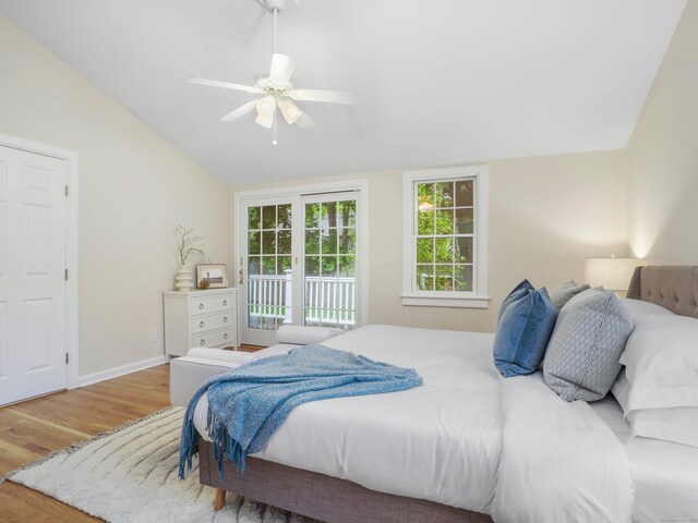 8 Argentine Way, Norwalk, CT 06850 - bedroom featuring wood finished floors, access to outside, lofted ceiling, a ceiling fan, and baseboards
