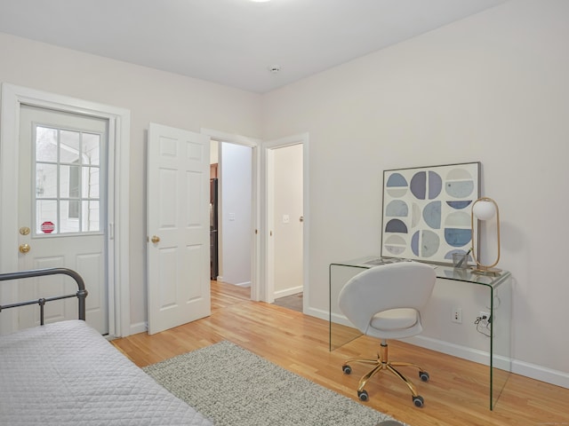 8 Argentine Way, Norwalk, CT 06850 - bedroom with light wood-type flooring, a desk, and baseboards