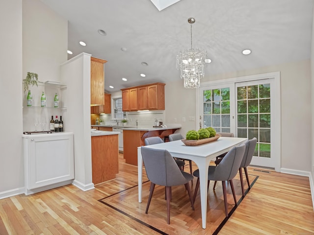 8 Argentine Way, Norwalk, CT 06850 - dining space featuring recessed lighting, plenty of natural light, light wood-style flooring, a chandelier, and baseboards