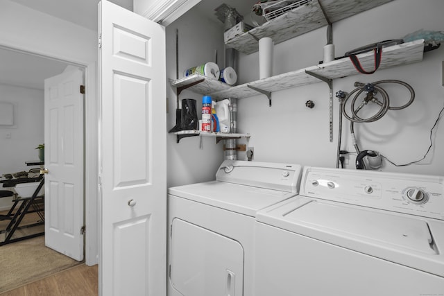 136 Pembroke Rd Unit 6-49, Danbury, CT 06811 - laundry room with laundry area, light wood-style floors, and separate washer and dryer
