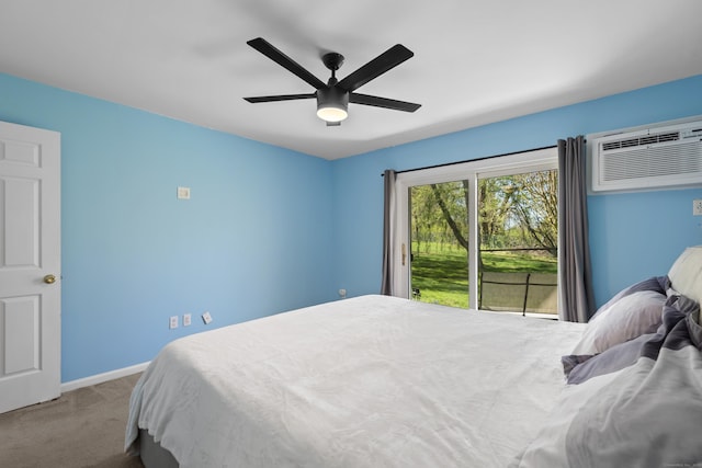 136 Pembroke Rd Unit 6-49, Danbury, CT 06811 - bedroom featuring baseboards, ceiling fan, carpet, and a wall mounted air conditioner