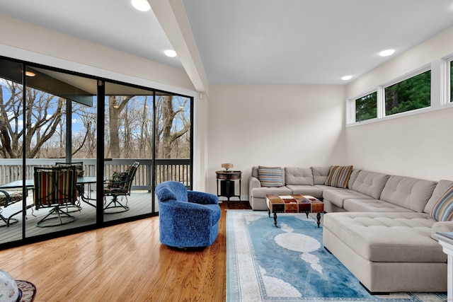 living room featuring wood finished floors and recessed lighting