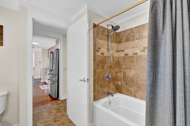 full bathroom featuring shower / bath combination with curtain
