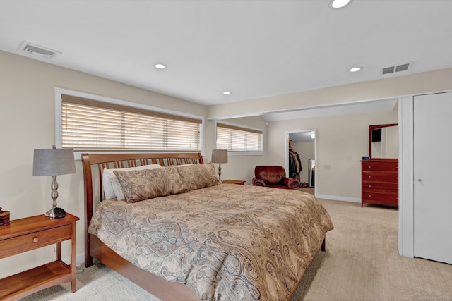 bedroom with recessed lighting, visible vents, carpet flooring, and baseboards