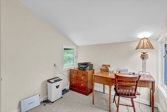 office area with vaulted ceiling and baseboards