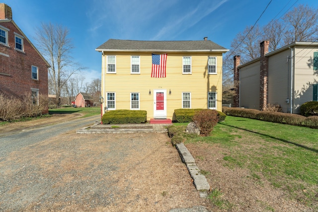 574 Fabyan Rd, Thompson, CT 06255 - colonial-style house with a front lawn