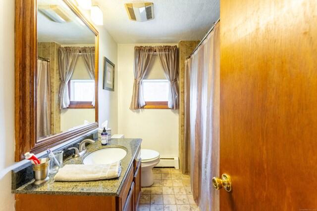 574 Fabyan Rd, Thompson, CT 06255 - bathroom featuring a baseboard radiator, a shower with curtain, toilet, vanity, and visible vents