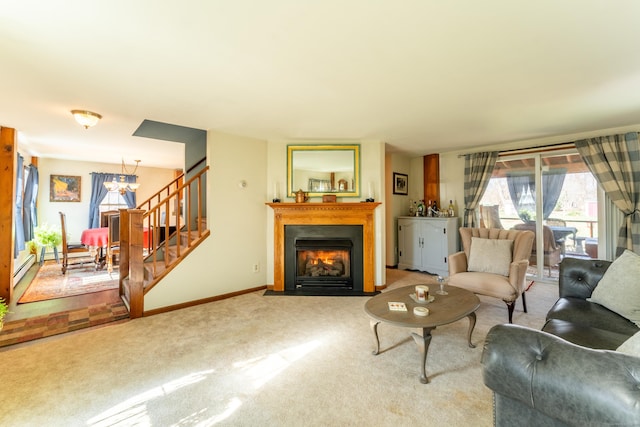 574 Fabyan Rd, Thompson, CT 06255 - living room featuring carpet floors, a chandelier, baseboards, stairway, and a fireplace with flush hearth