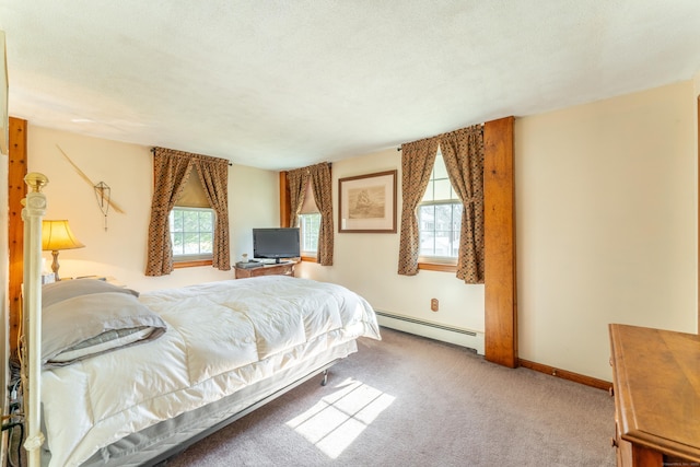 574 Fabyan Rd, Thompson, CT 06255 - carpeted bedroom with baseboard heating and baseboards