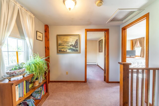 574 Fabyan Rd, Thompson, CT 06255 - hallway featuring attic access, a baseboard radiator, carpet floors, and baseboards