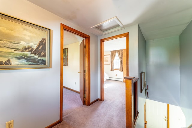 574 Fabyan Rd, Thompson, CT 06255 - hall with attic access, carpet flooring, an upstairs landing, baseboards, and a baseboard radiator