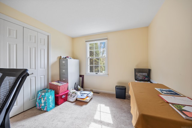 interior space featuring baseboards and a closet