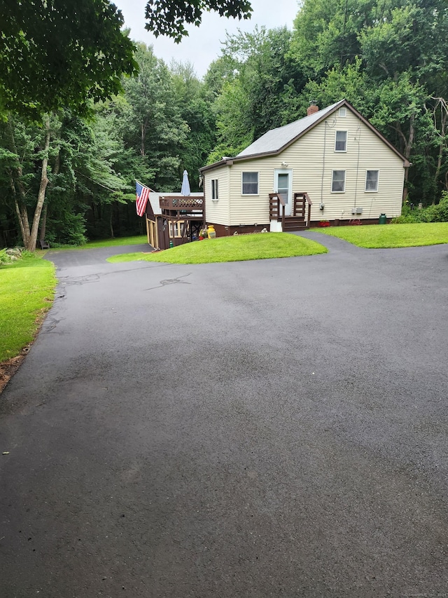 8 Boyer Rd, Stafford, CT 06076 - view of front of property with a front lawn, asphalt driveway, and a chimney
