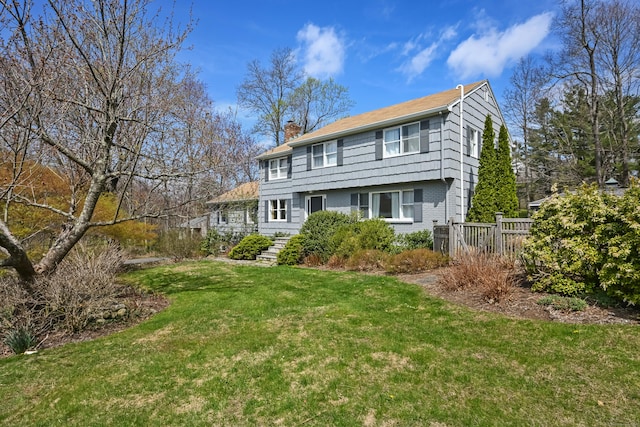 36 Pheasant Ridge Rd, Redding, CT 06896 - colonial inspired home with a chimney and a front lawn