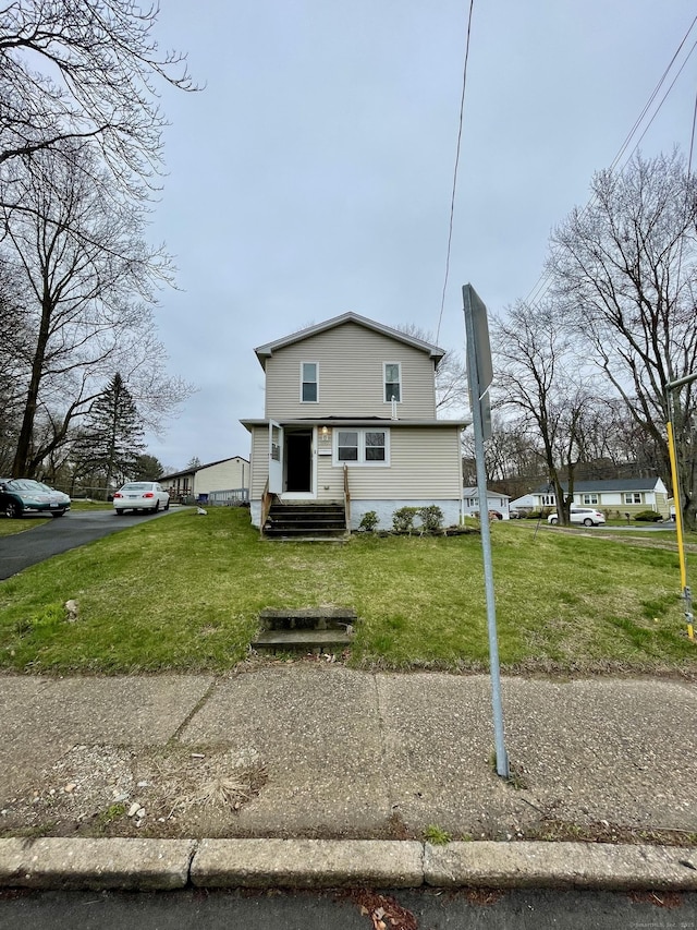 1895 Reservoir Ave, Bridgeport, CT 06606 - view of front of home with a front lawn