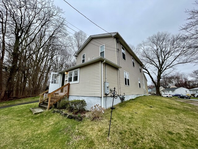1895 Reservoir Ave, Bridgeport, CT 06606 - view of side of property with a yard