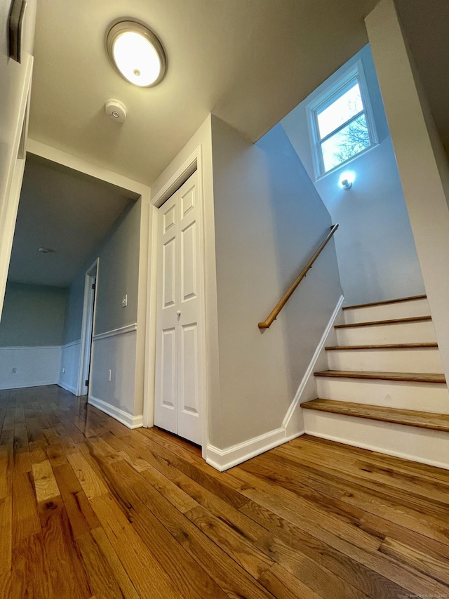 1895 Reservoir Ave, Bridgeport, CT 06606 - staircase with a skylight, wood-type flooring, and baseboards