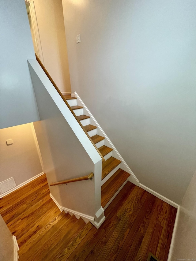 1895 Reservoir Ave, Bridgeport, CT 06606 - stairs featuring wood finished floors and visible vents