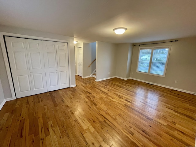 1895 Reservoir Ave, Bridgeport, CT 06606 - unfurnished bedroom featuring wood finished floors and baseboards