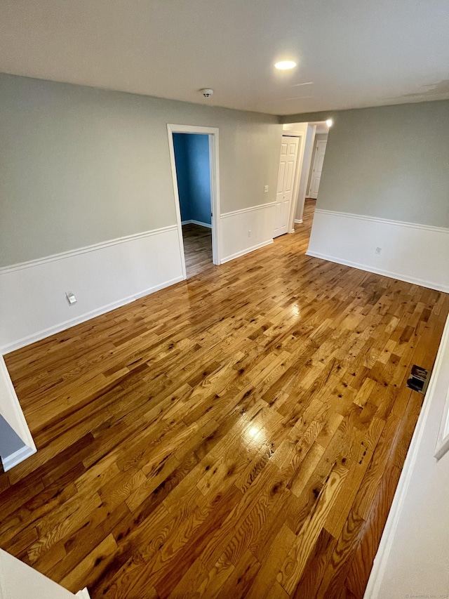 1895 Reservoir Ave, Bridgeport, CT 06606 - empty room with wood finished floors and baseboards