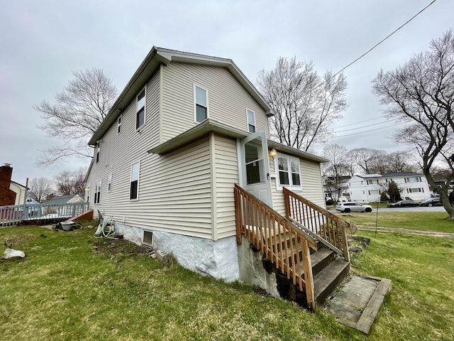 1895 Reservoir Ave, Bridgeport, CT 06606 - back of property featuring a lawn