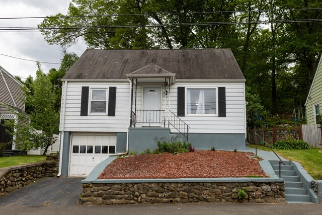 70 Manners Ave, Naugatuck, CT 06770 - view of front of property with driveway and an attached garage