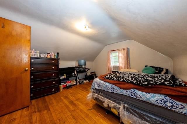 70 Manners Ave, Naugatuck, CT 06770 - bedroom featuring hardwood / wood-style floors, lofted ceiling, and cooling unit