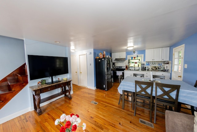 70 Manners Ave, Naugatuck, CT 06770 - living room featuring light wood-type flooring and baseboards