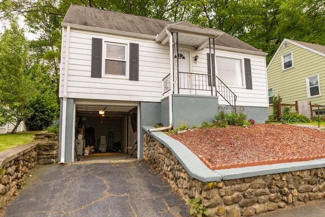 70 Manners Ave, Naugatuck, CT 06770 - ranch-style home with driveway and an attached garage