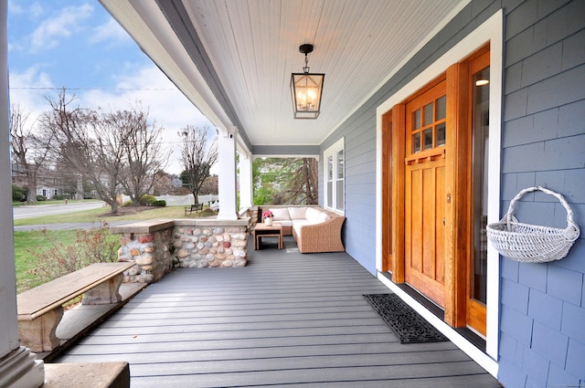 1186 Farmington Ave, West Hartford, CT 06107 - wooden terrace featuring covered porch and an outdoor living space