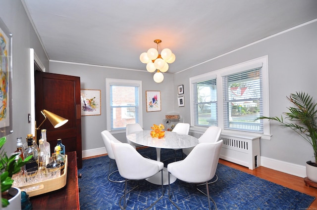 1186 Farmington Ave, West Hartford, CT 06107 - dining room featuring a chandelier, ornamental molding, baseboards, and dark wood-style floors