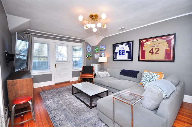 1186 Farmington Ave, West Hartford, CT 06107 - living area with a chandelier, baseboards, wood finished floors, and vaulted ceiling