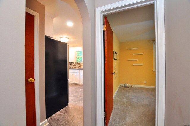 27 Brook St, New Britain, CT 06051 - corridor with a sink and arched walkways