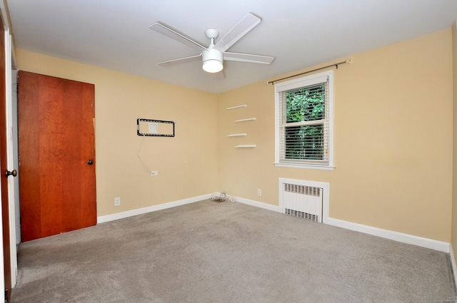 27 Brook St, New Britain, CT 06051 - carpeted empty room with radiator heating unit and a ceiling fan