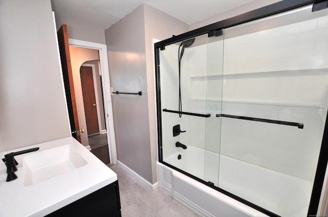 27 Brook St, New Britain, CT 06051 - bathroom with combined bath / shower with glass door, vanity, and tile patterned flooring