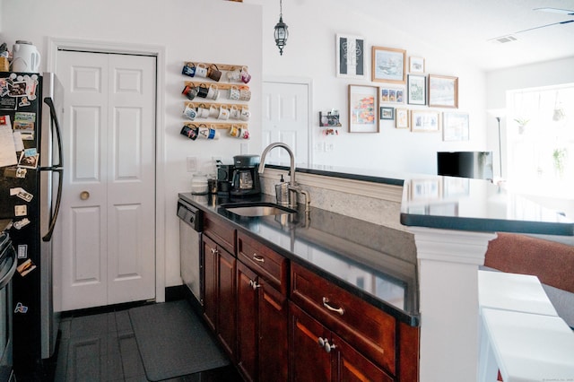 15 Forest Glen Cir Unit 19, Middletown, CT 06419 - kitchen with appliances with stainless steel finishes, a sink, and reddish brown cabinets