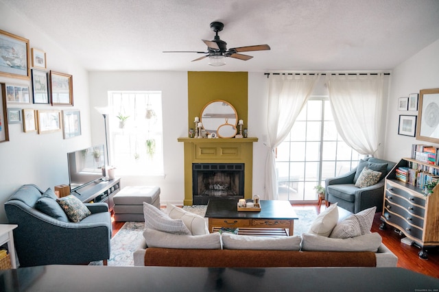 15 Forest Glen Cir Unit 19, Middletown, CT 06419 - living area with wood finished floors, ceiling fan, and a fireplace