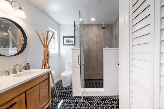 bathroom with recessed lighting, tile patterned flooring, toilet, vanity, and a stall shower