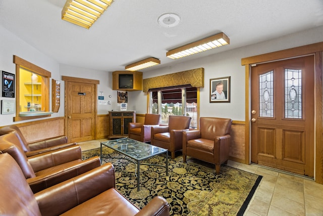 197 Norwich New London Tpke, Montville, CT 06382 - tiled living area with a wainscoted wall