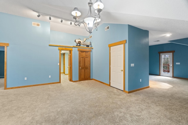 197 Norwich New London Tpke, Montville, CT 06382 - carpeted empty room with visible vents, baseboards, and an inviting chandelier
