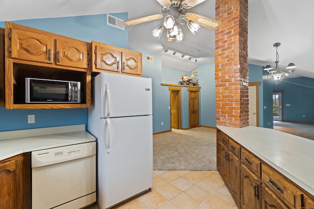 197 Norwich New London Tpke, Montville, CT 06382 - kitchen with light countertops, white appliances, ceiling fan with notable chandelier, light carpet, and lofted ceiling