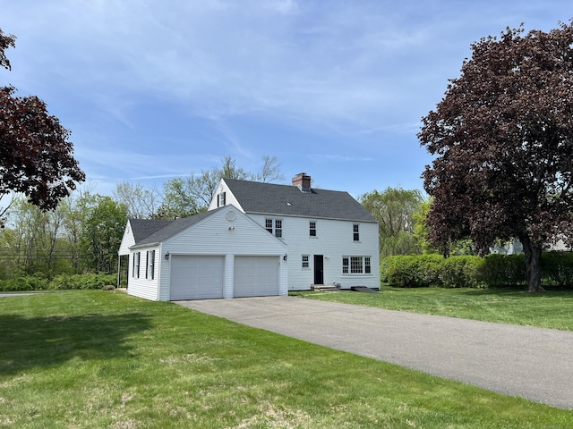 464 Highland St, Wethersfield, CT 06109 - colonial house with a chimney, a front yard, roof with shingles, an attached garage, and driveway