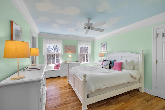 710 Alexander Dr, Guilford, CT 06437 - bedroom featuring light wood finished floors, visible vents, ceiling fan, and crown molding