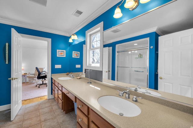 710 Alexander Dr, Guilford, CT 06437 - full bathroom with visible vents, a sink, a shower with shower door, and ornamental molding