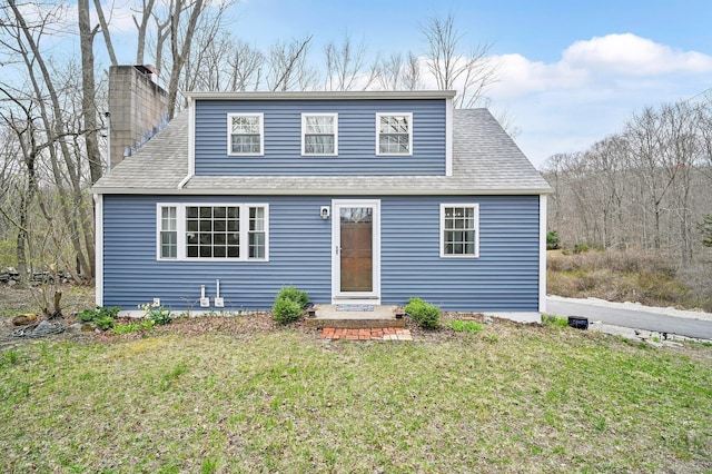 378 Rte 87, Columbia, CT 06237 - bungalow-style house featuring a front lawn, roof with shingles, and a chimney