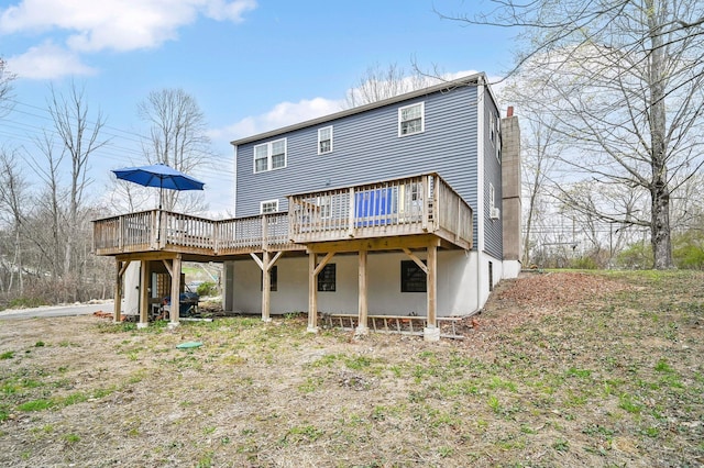 378 Rte 87, Columbia, CT 06237 - back of house with a chimney and a wooden deck