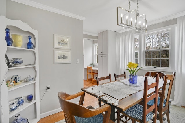 378 Rte 87, Columbia, CT 06237 - dining space featuring crown molding, a notable chandelier, baseboards, and light wood-style floors