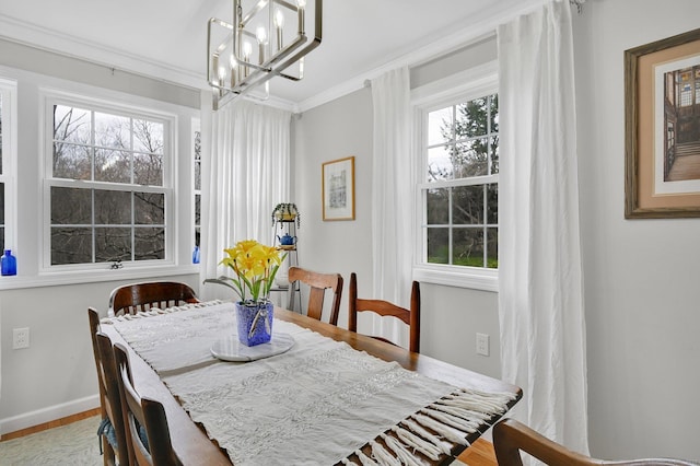 378 Rte 87, Columbia, CT 06237 - dining area featuring baseboards, ornamental molding, a chandelier, and wood finished floors