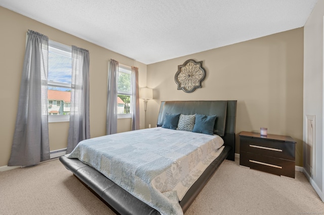 1 Abbott Rd Unit 32, Ellington, CT 06029 - bedroom with light carpet, baseboards, and a textured ceiling